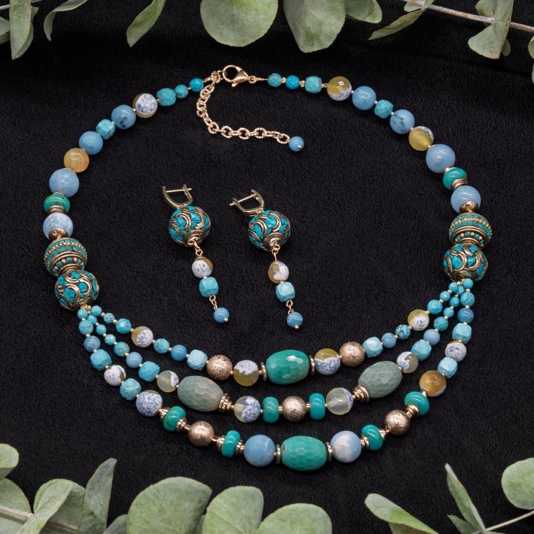 Tidal Mosaic necklace and earrings arranged together