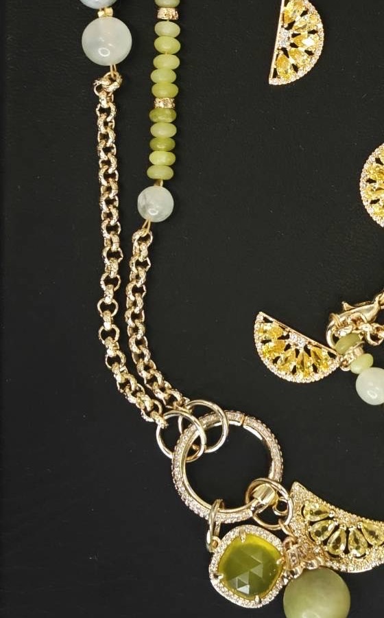 Verdant Light necklace with green beads, gold-toned chain and openwork charms